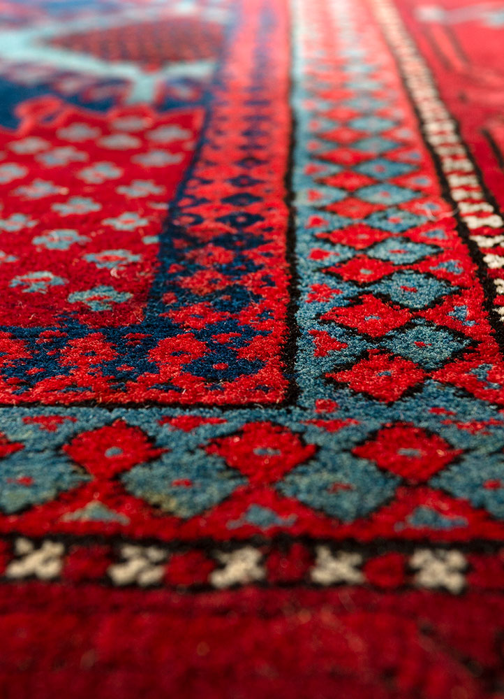 aalam red and orange wool hand knotted Rug - CloseUp