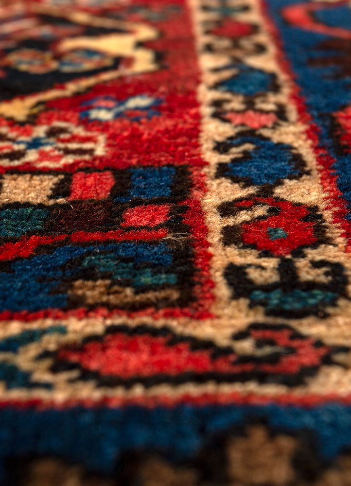 aalam red and orange wool hand knotted Rug - CloseUp