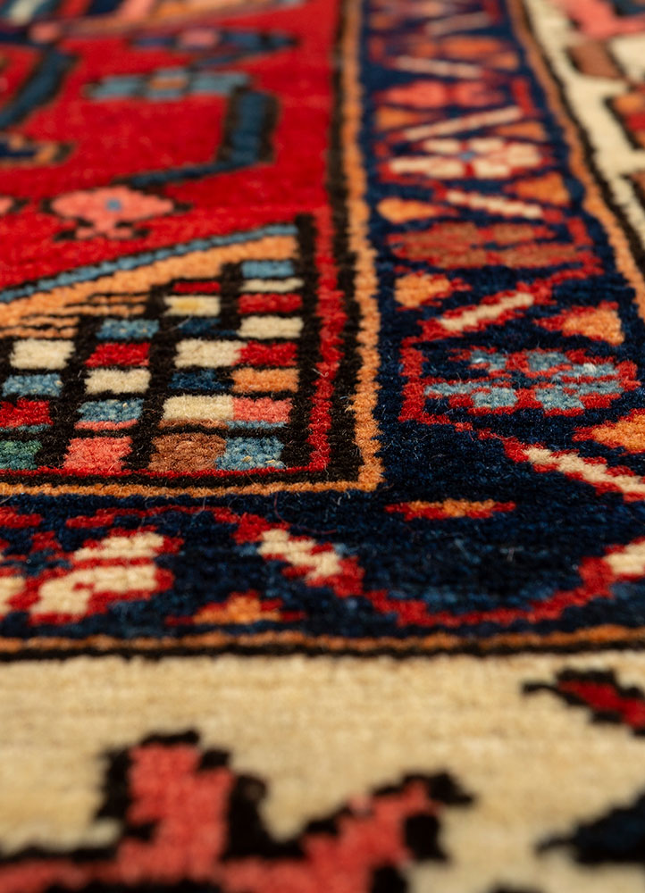 aalam red and orange wool hand knotted Rug - CloseUp