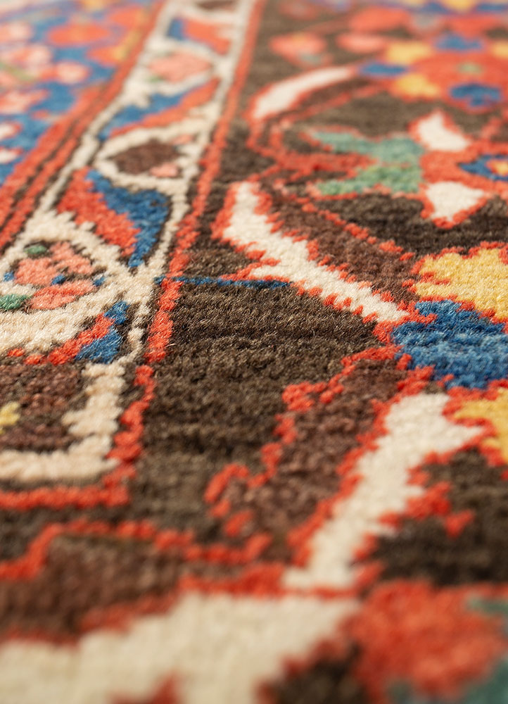 aalam red and orange wool hand knotted Rug - CloseUp