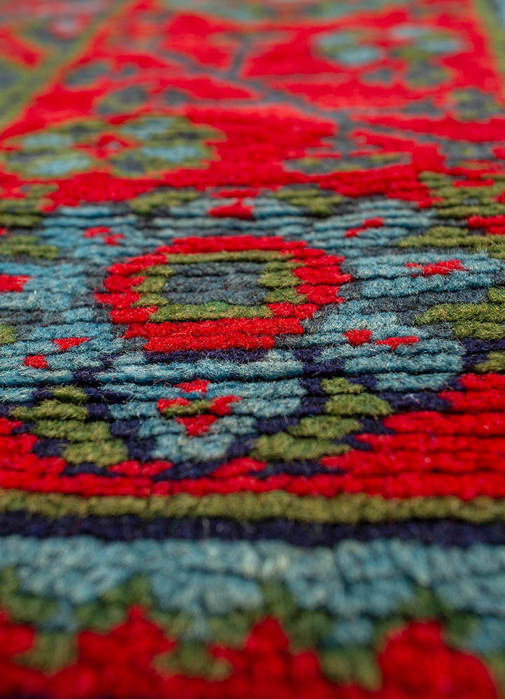 aalam red and orange wool hand knotted Rug - CloseUp