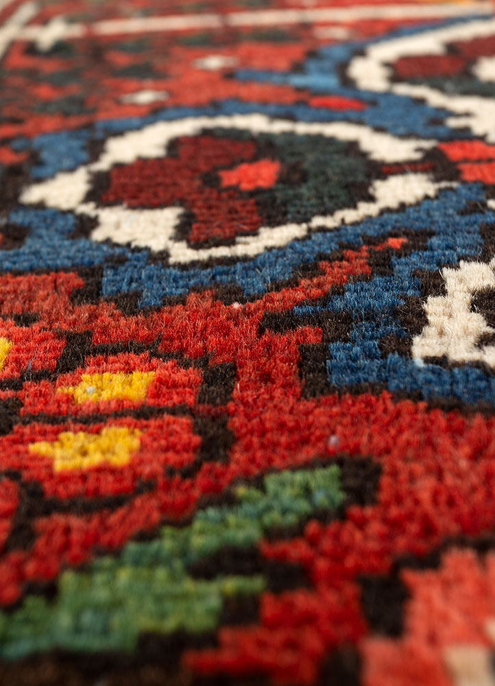 aalam red and orange wool hand knotted Rug - CloseUp