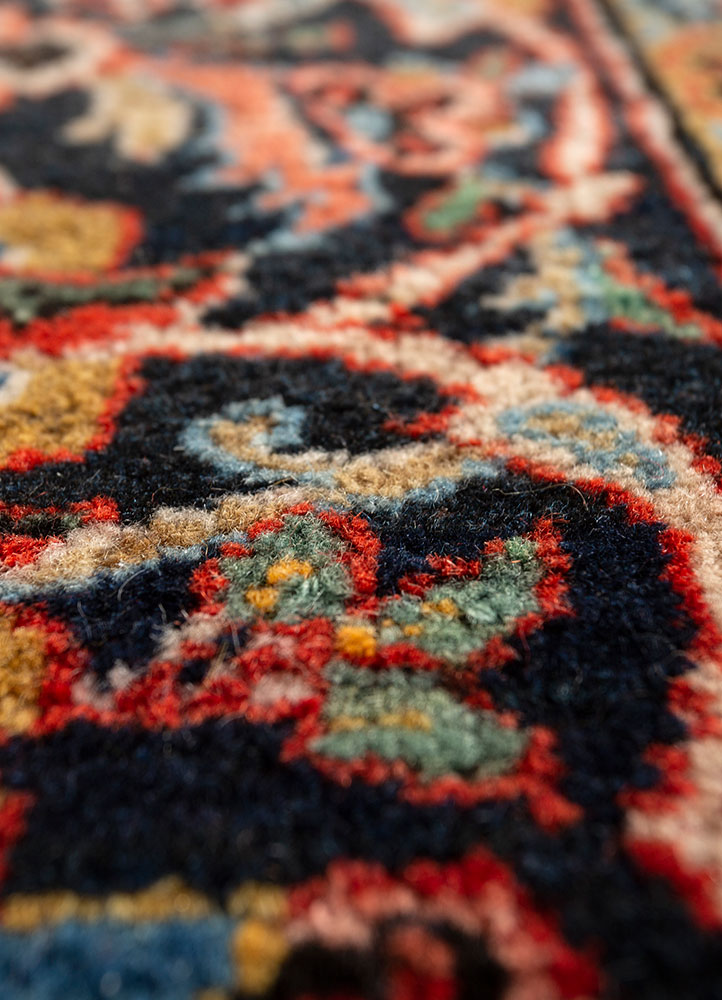 aalam red and orange wool hand knotted Rug - CloseUp