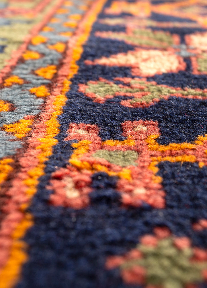 aalam red and orange wool hand knotted Rug - CloseUp