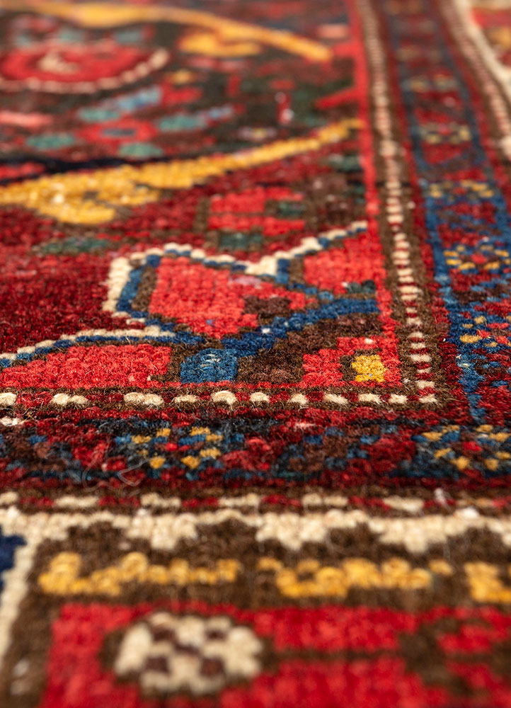 aalam red and orange wool hand knotted Rug - CloseUp