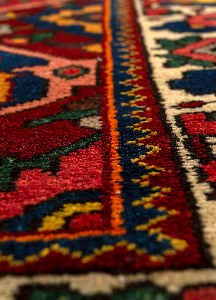 aalam red and orange wool hand knotted Rug - CloseUp
