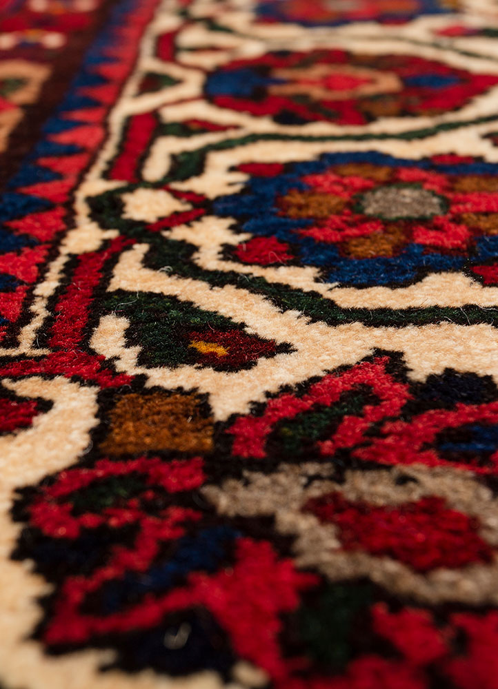 aalam red and orange wool hand knotted Rug - CloseUp