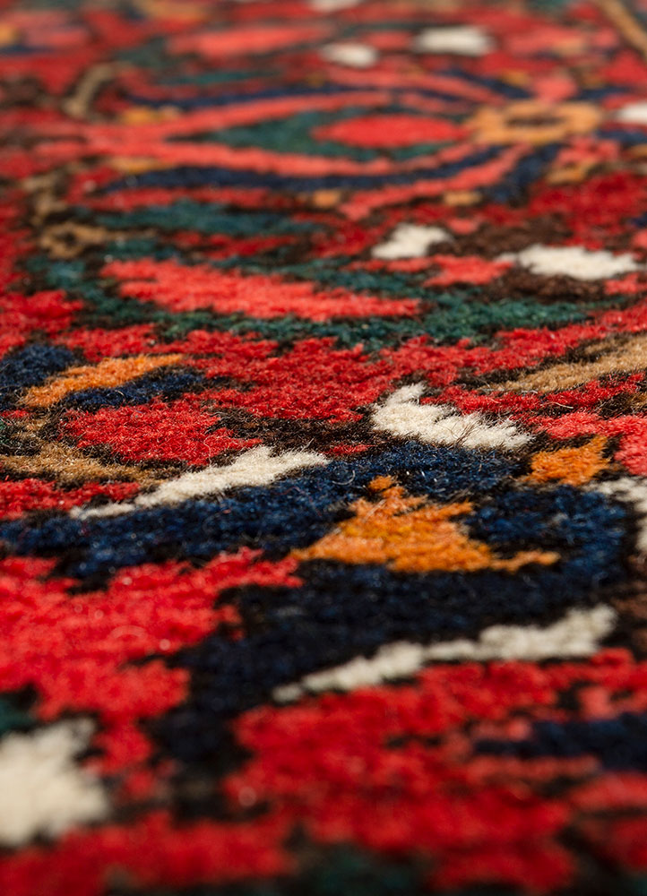 aalam red and orange wool hand knotted Rug - CloseUp