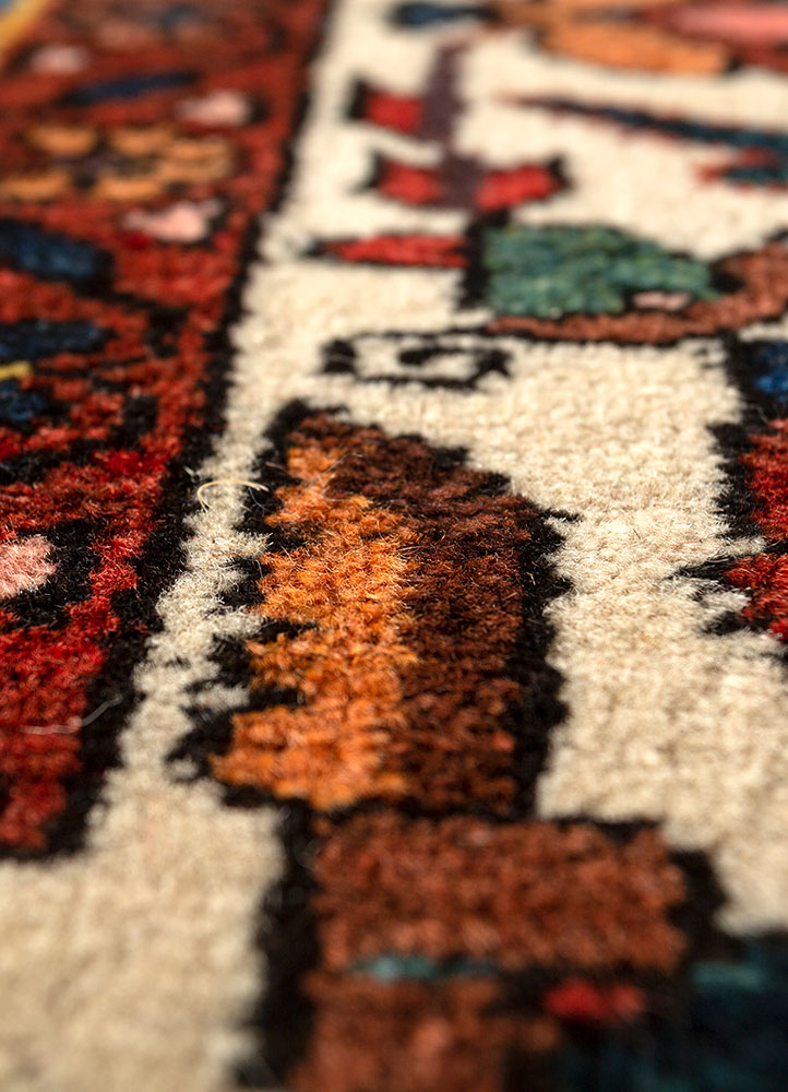 aalam red and orange wool hand knotted Rug - CloseUp