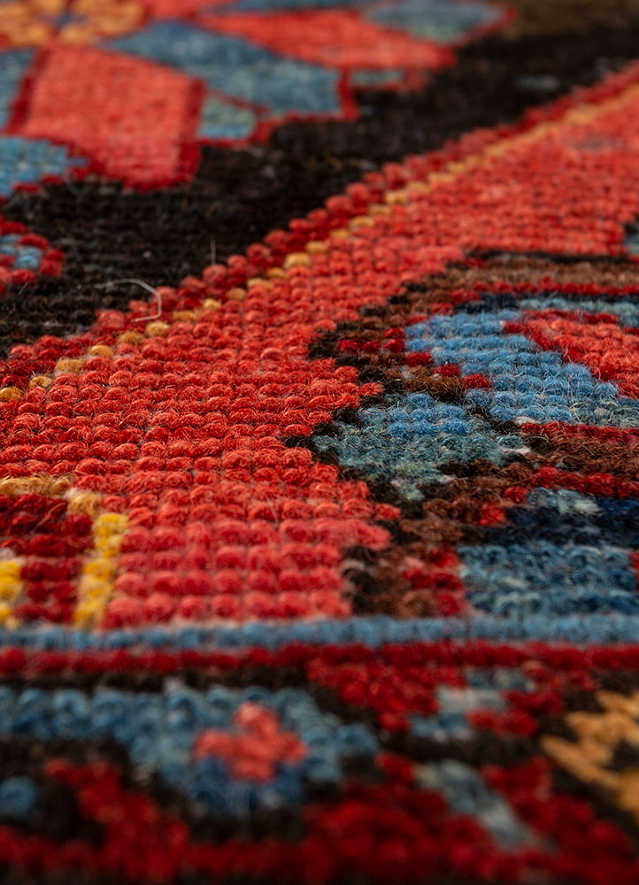aalam red and orange wool hand knotted Rug - CloseUp