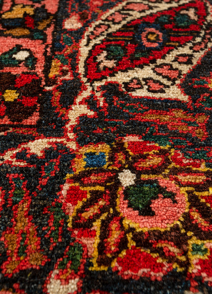 aalam red and orange wool hand knotted Rug - CloseUp