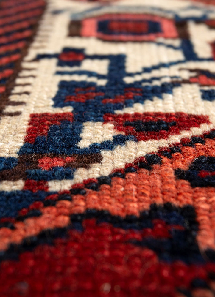 aalam red and orange wool hand knotted Rug - CloseUp