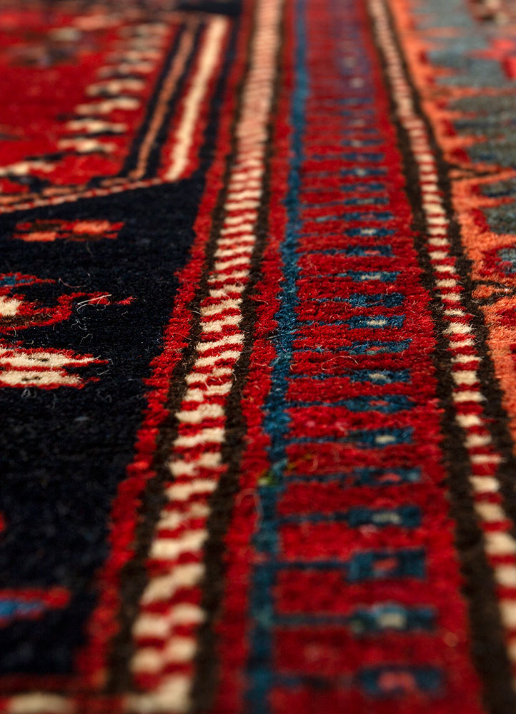 aalam red and orange wool hand knotted Rug - CloseUp