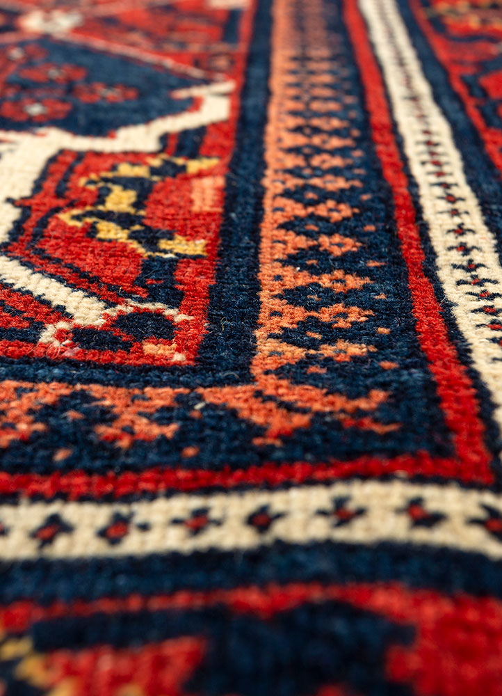 aalam red and orange wool hand knotted Rug - CloseUp