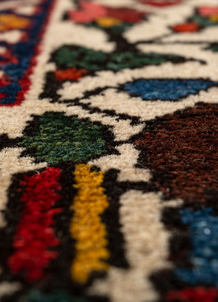 aalam red and orange wool hand knotted Rug - CloseUp