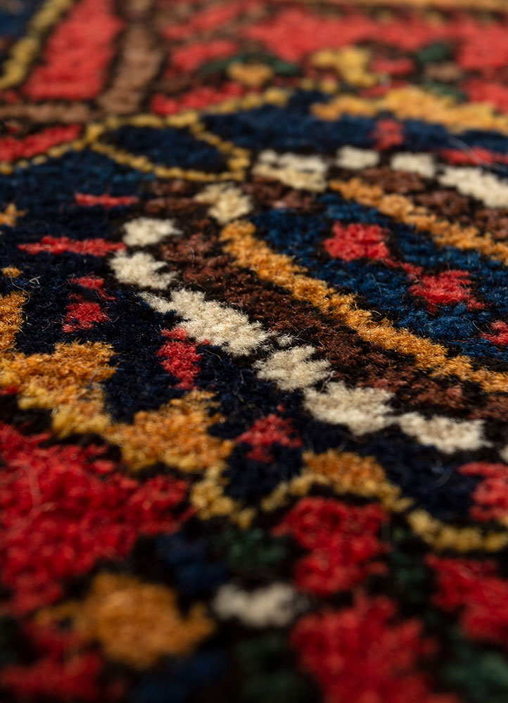aalam red and orange wool hand knotted Rug - CloseUp