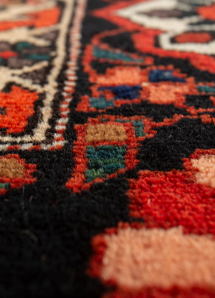 aalam red and orange wool hand knotted Rug - CloseUp