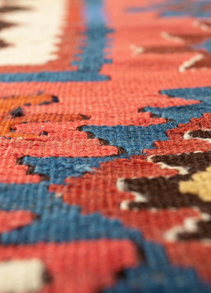 aalam red and orange wool hand knotted Rug - CloseUp