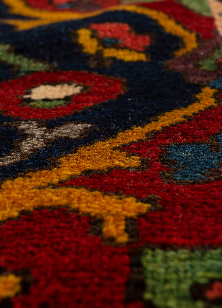 aalam red and orange wool hand knotted Rug - CloseUp