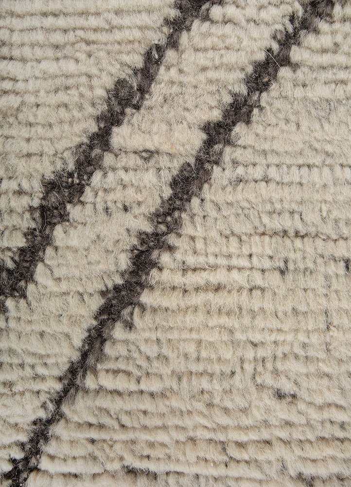 manifest ivory wool hand knotted Rug - CloseUp