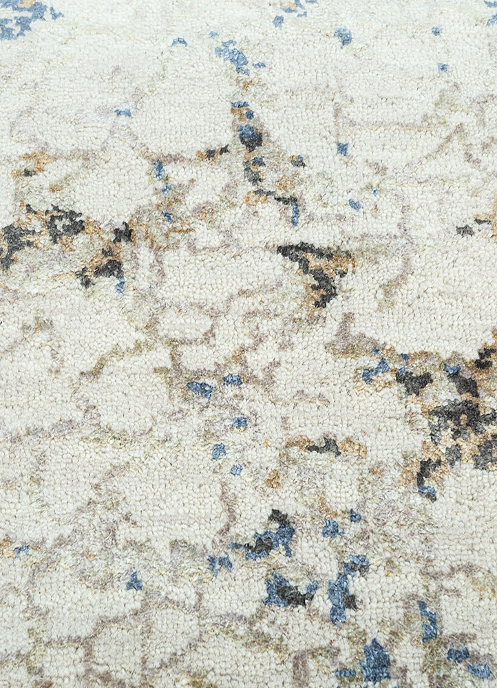 hidden by kavi ivory wool and silk hand knotted Rug - CloseUp