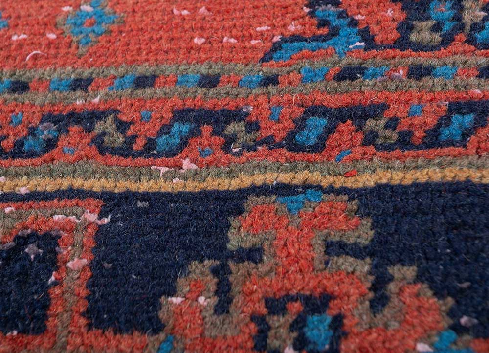 vintage red and orange wool hand knotted Rug - CloseUp