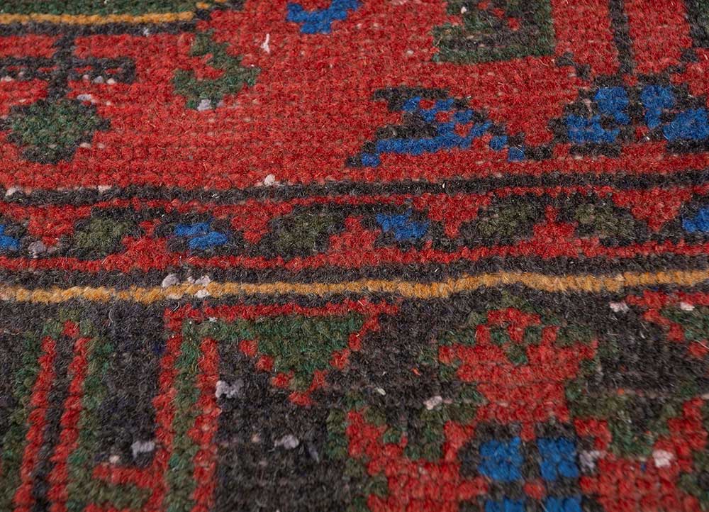vintage red and orange wool hand knotted Rug - CloseUp