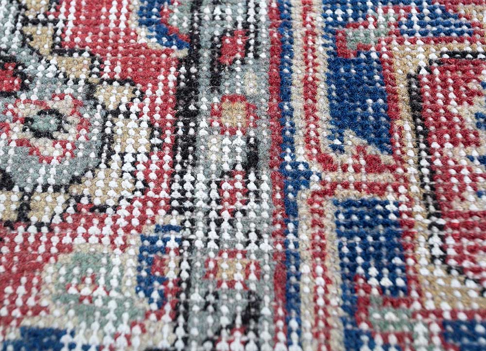 vintage red and orange wool hand knotted Rug - CloseUp