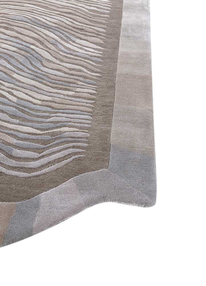 infini blue wool and viscose hand tufted Rug - Corner