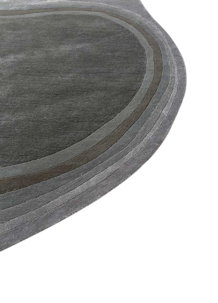 come around green wool and viscose hand tufted Rug - Corner