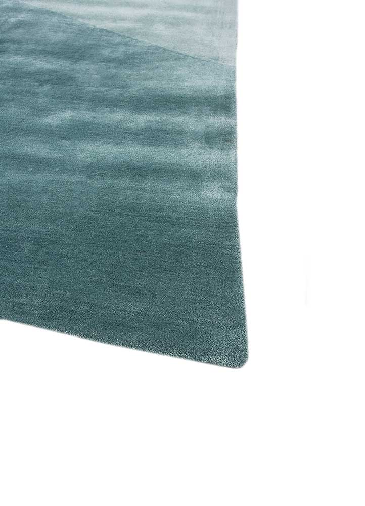 come around blue viscose hand tufted Rug - Corner