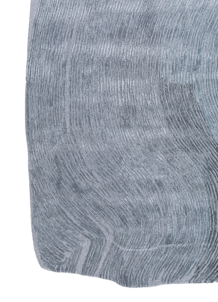 infini blue wool and viscose hand tufted Rug - Corner