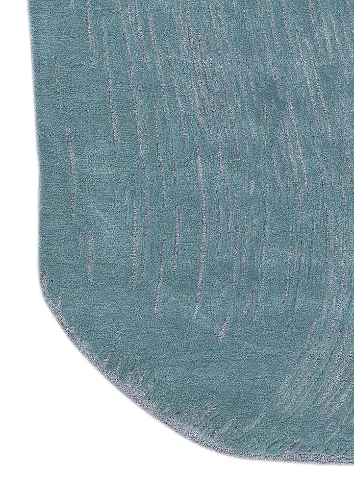 infini blue wool and viscose hand tufted Rug - Corner