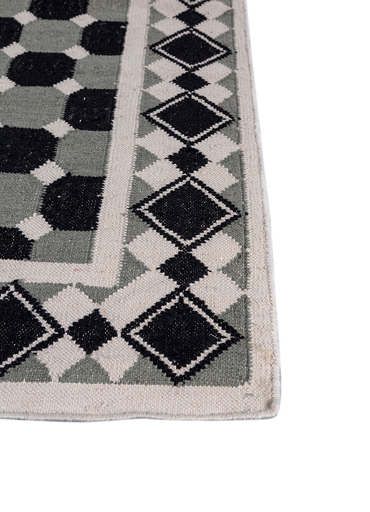 alhambra grey and black wool flat weaves Rug - Corner