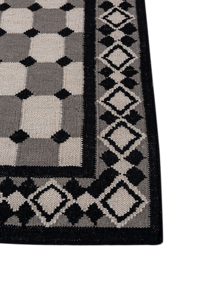 alhambra grey and black wool flat weaves Rug - Corner