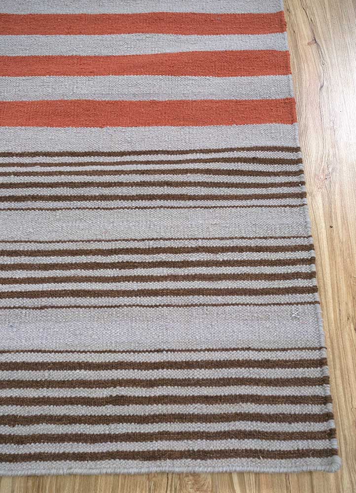 indusbar red and orange wool flat weaves Rug - Corner