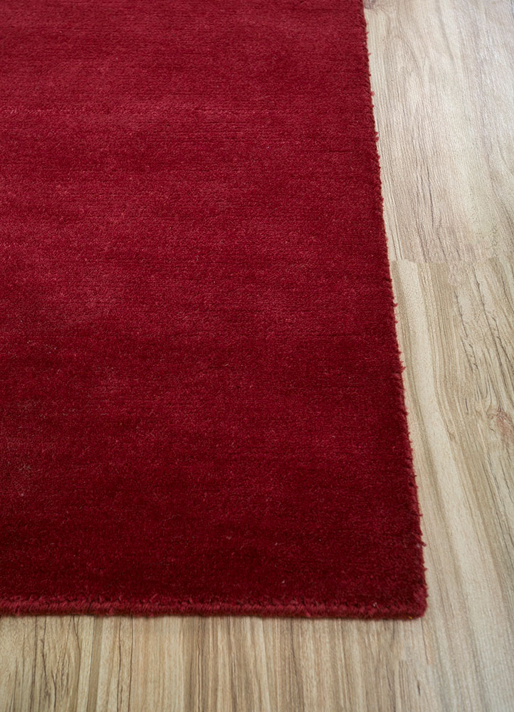 sthir red and orange wool hand knotted Rug - Corner