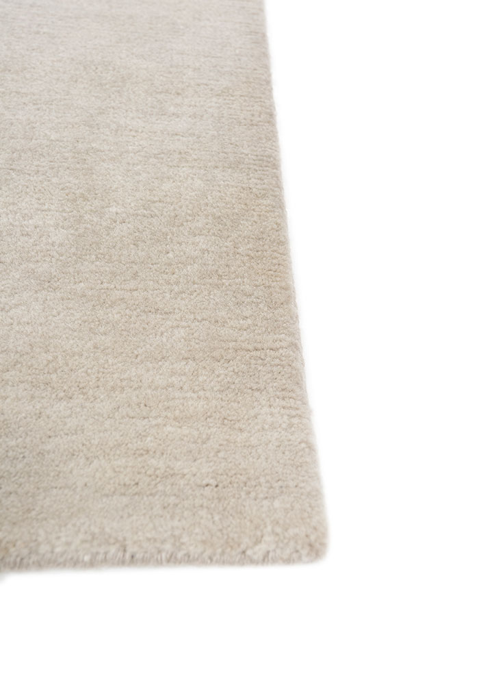 sthir ivory wool hand knotted Rug - Corner