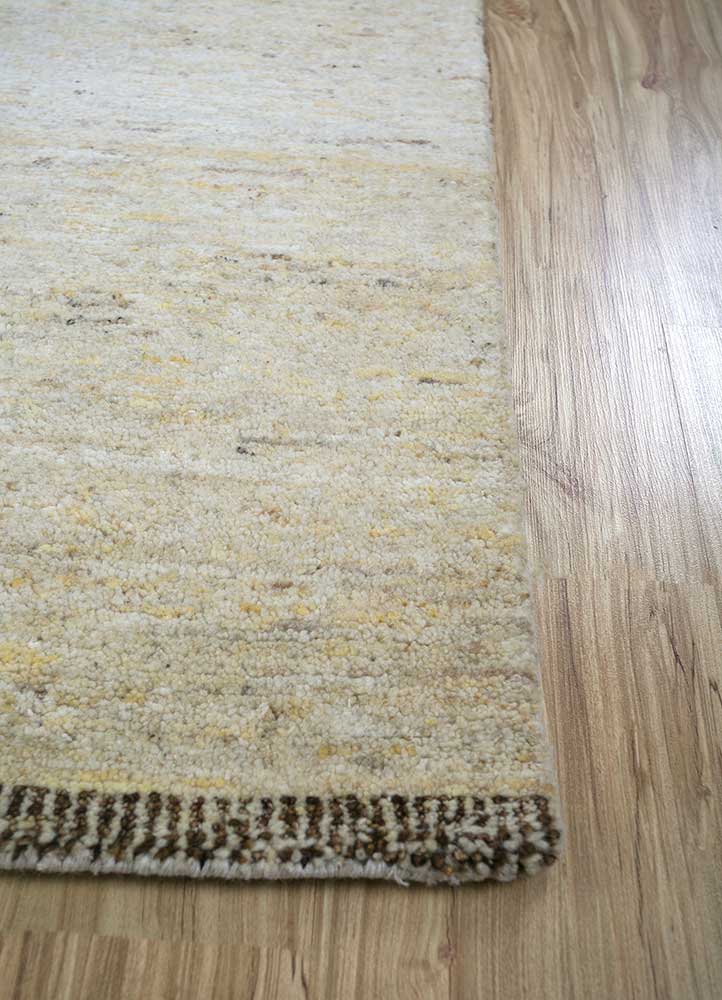 manifest ivory wool hand knotted Rug - Corner