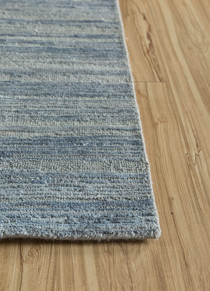 manifest blue wool and silk hand knotted Rug - Corner