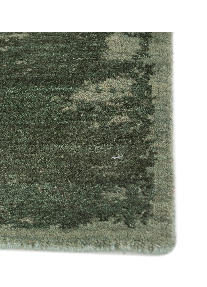 urban pause by kavi green wool hand knotted Rug - Corner