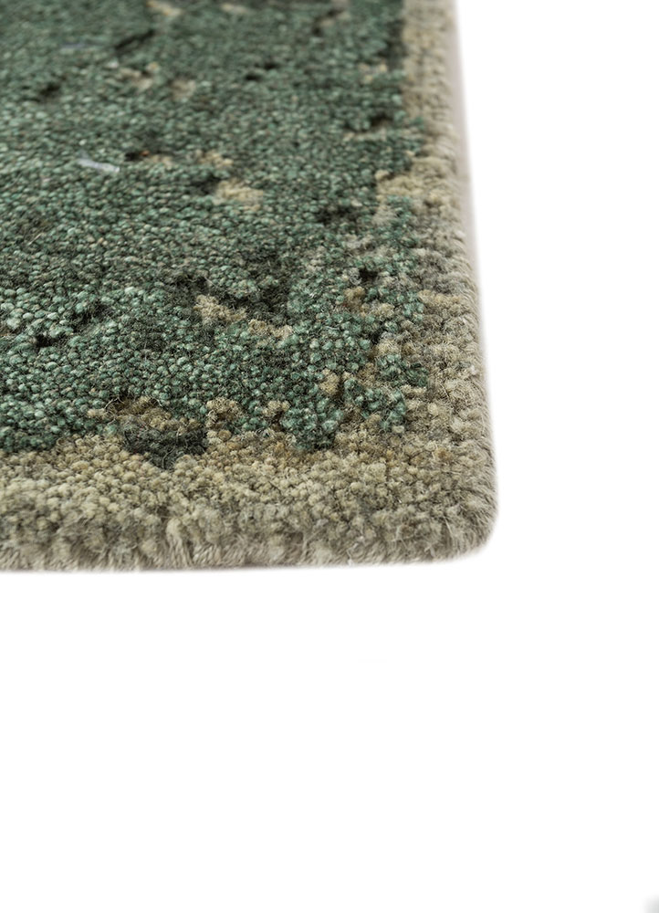 urban pause by kavi green wool hand knotted Rug - Corner