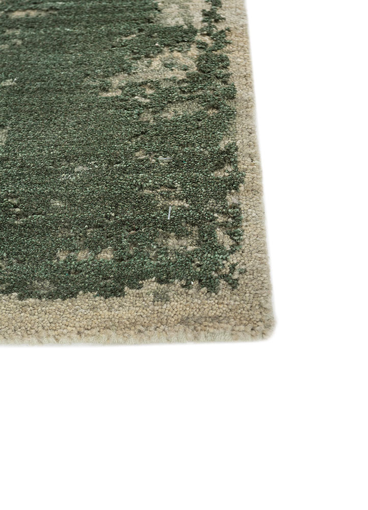 urban pause by kavi green wool hand knotted Rug - Corner