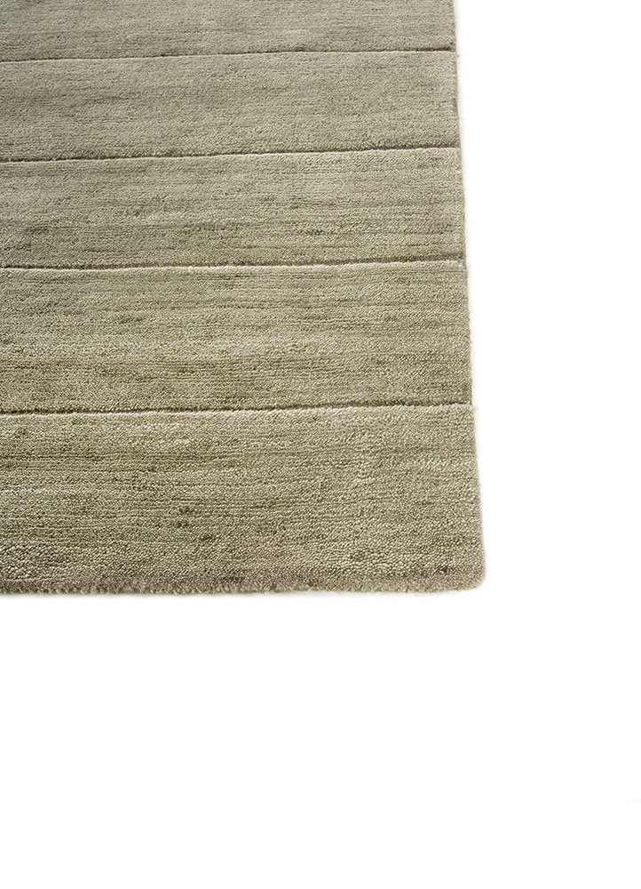 sthir green wool hand knotted Rug - Corner