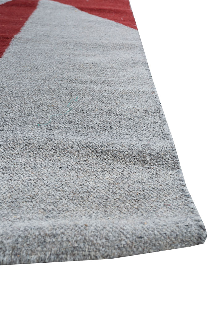 indusbar red and orange wool flat weaves Rug - Corner