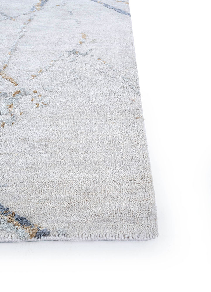 urban pause by kavi ivory wool and silk hand knotted Rug - Corner