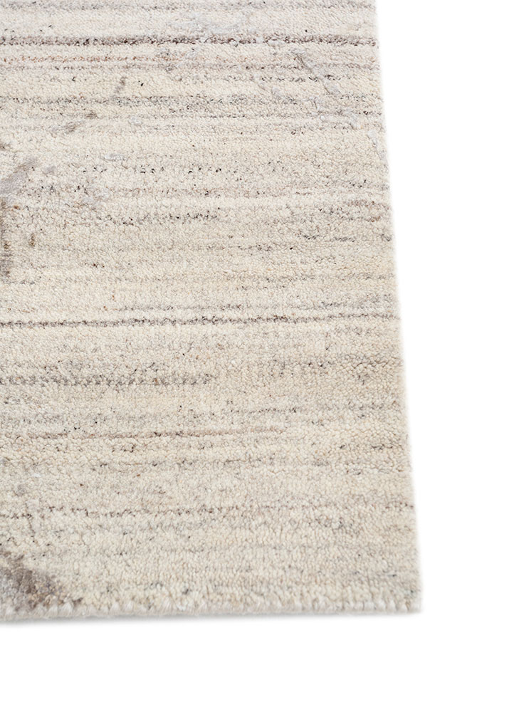 urban pause by kavi ivory wool and silk hand knotted Rug - Corner