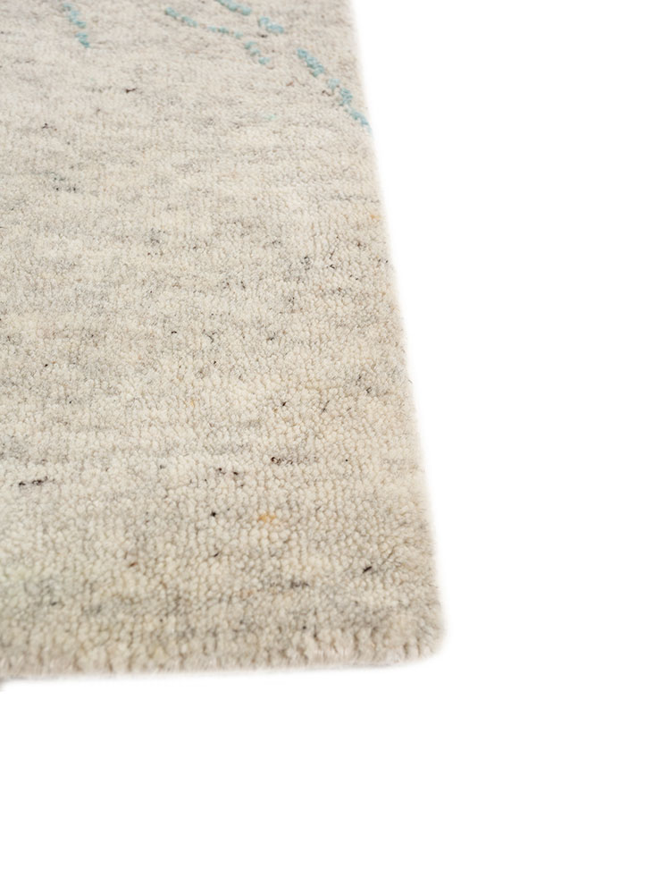 urban pause by kavi ivory wool and silk hand knotted Rug - Corner