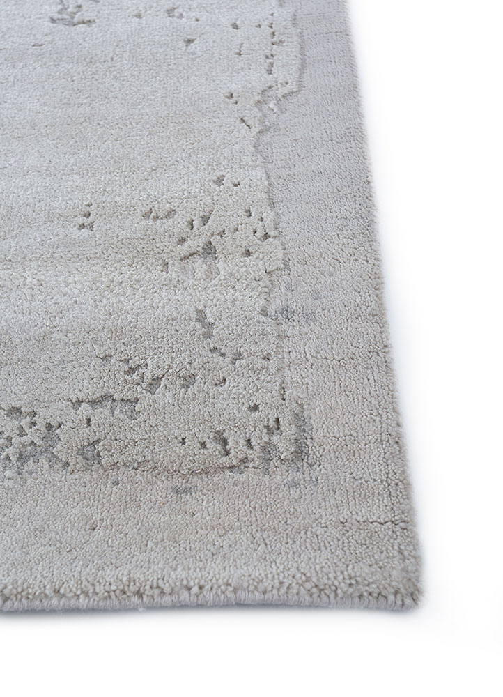 urban pause by kavi ivory wool and silk hand knotted Rug - Corner