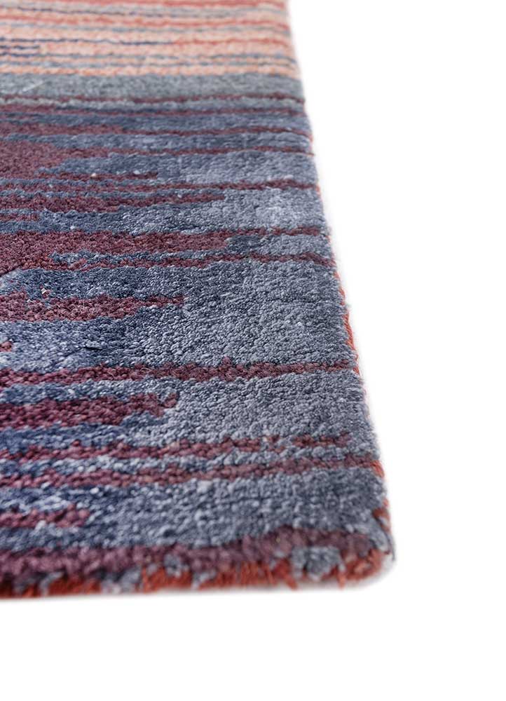 afterglow by kavi red and orange wool and bamboo silk hand knotted Rug - Corner